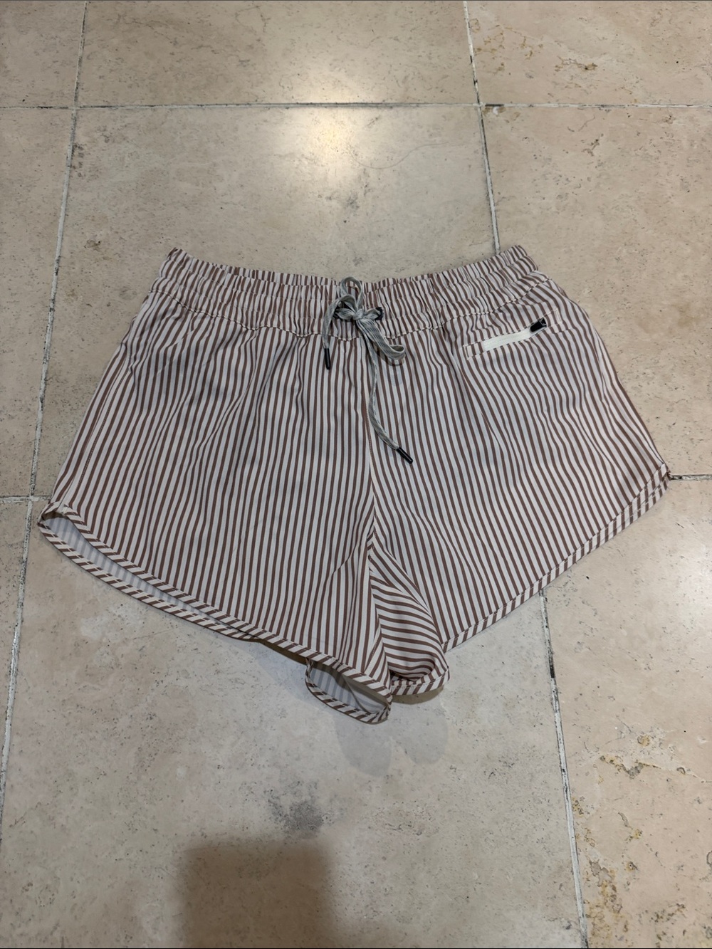 Vuori Striped Athletic Drawstring Shorts in Brown and White